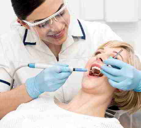 ablazione tartaro pulizia denti dentista roma